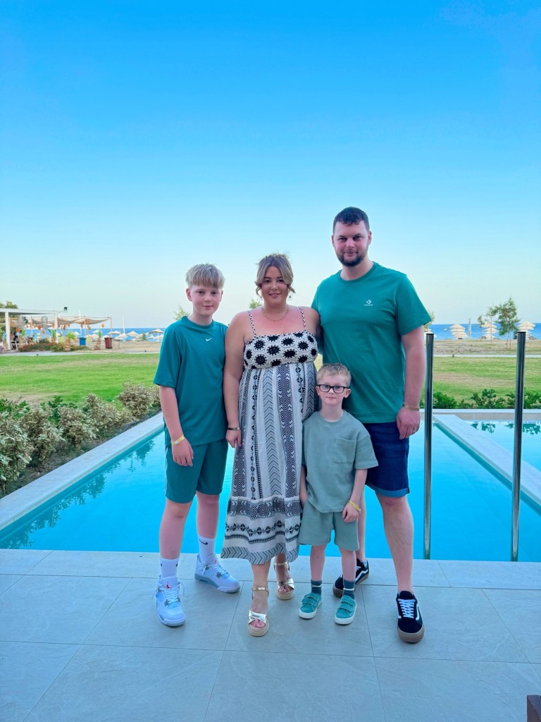 Family photo in beachfront suite with private pool 